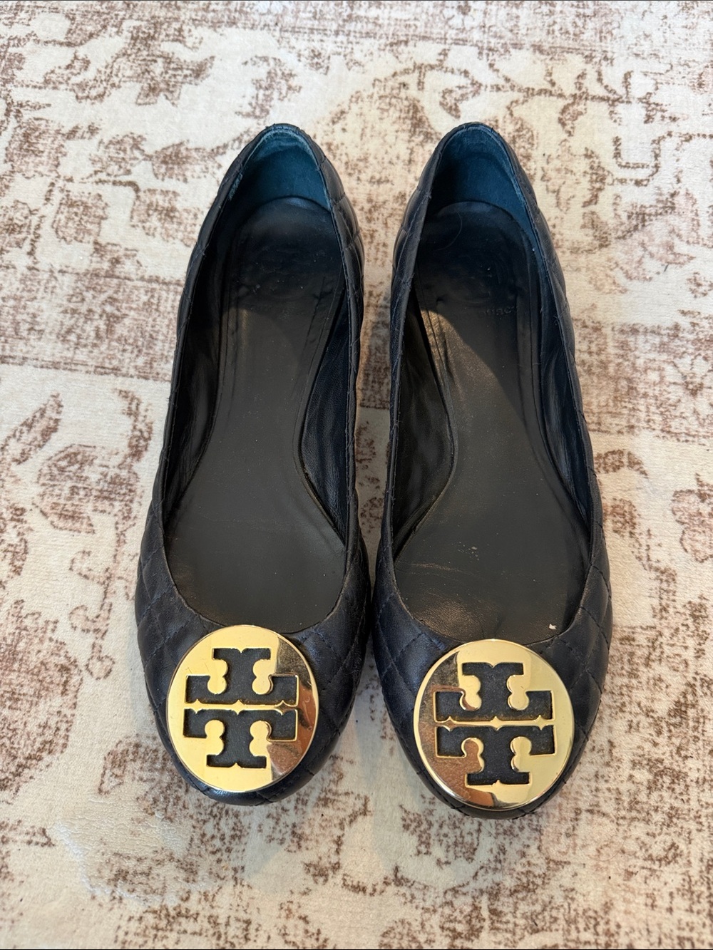 Tory Burch Black Quilted Leather Logo Round-Toe Ballet Flats with Gold Medallion